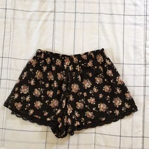 Silky black floral shorts with peek-a-boo lace